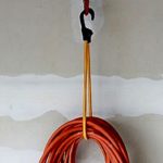 Which of these is the best way to hang electrical cords and hoses?
