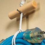 Which of these is the best way to hang electrical cords and hoses?